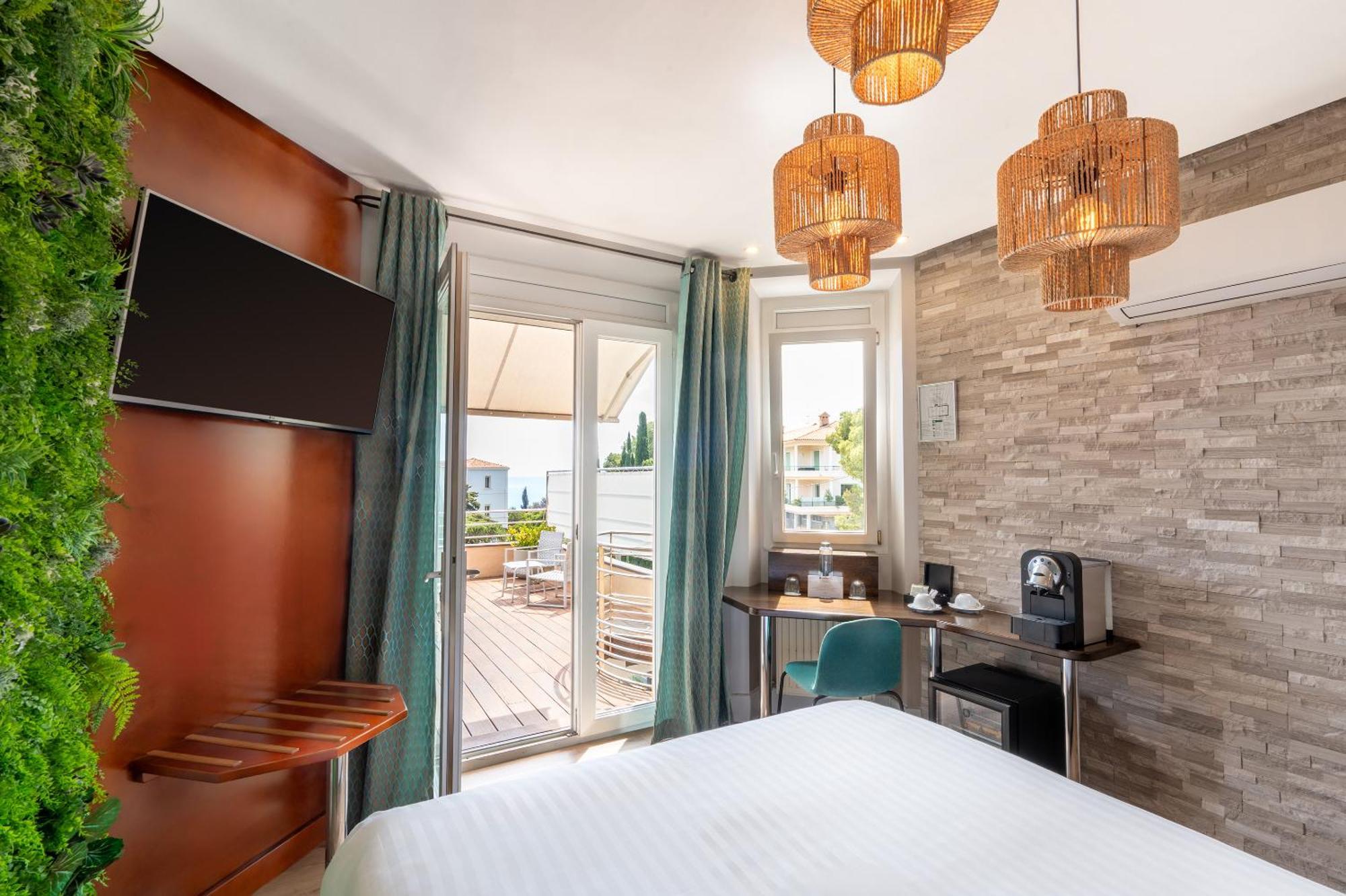 Junior Suite Queen Bed Private Terrace Panoramic Sea View