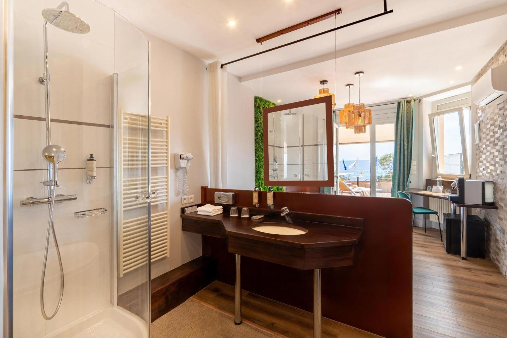 Junior Suite Queen Bed Private Terrace Panoramic Sea View